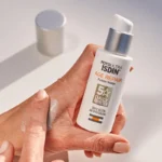 ضد آفتاب بی رنگ SPF50 ایج ریپیر فیوژن واتر ایزدین - Image 4